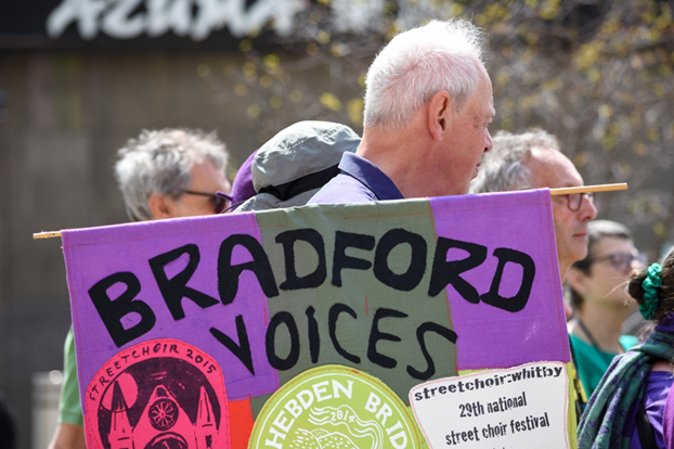 Bradford Voices with banner